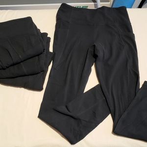 Athleta set of 4 Salutation Stash Pocket Tights